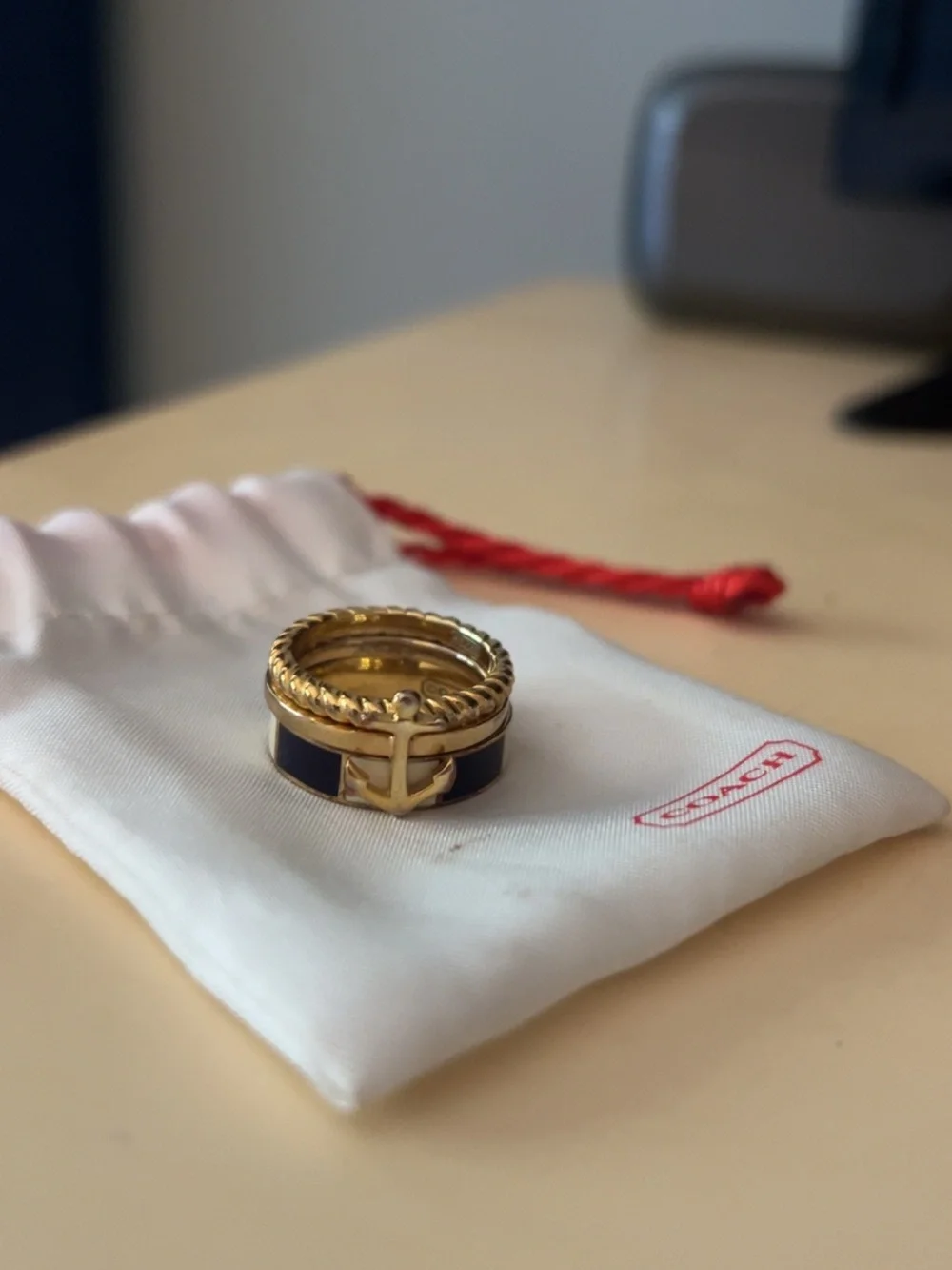Coach Stackable Ring Trio with Gold Anchor, Rope, and Navy and Cream Inlay bands